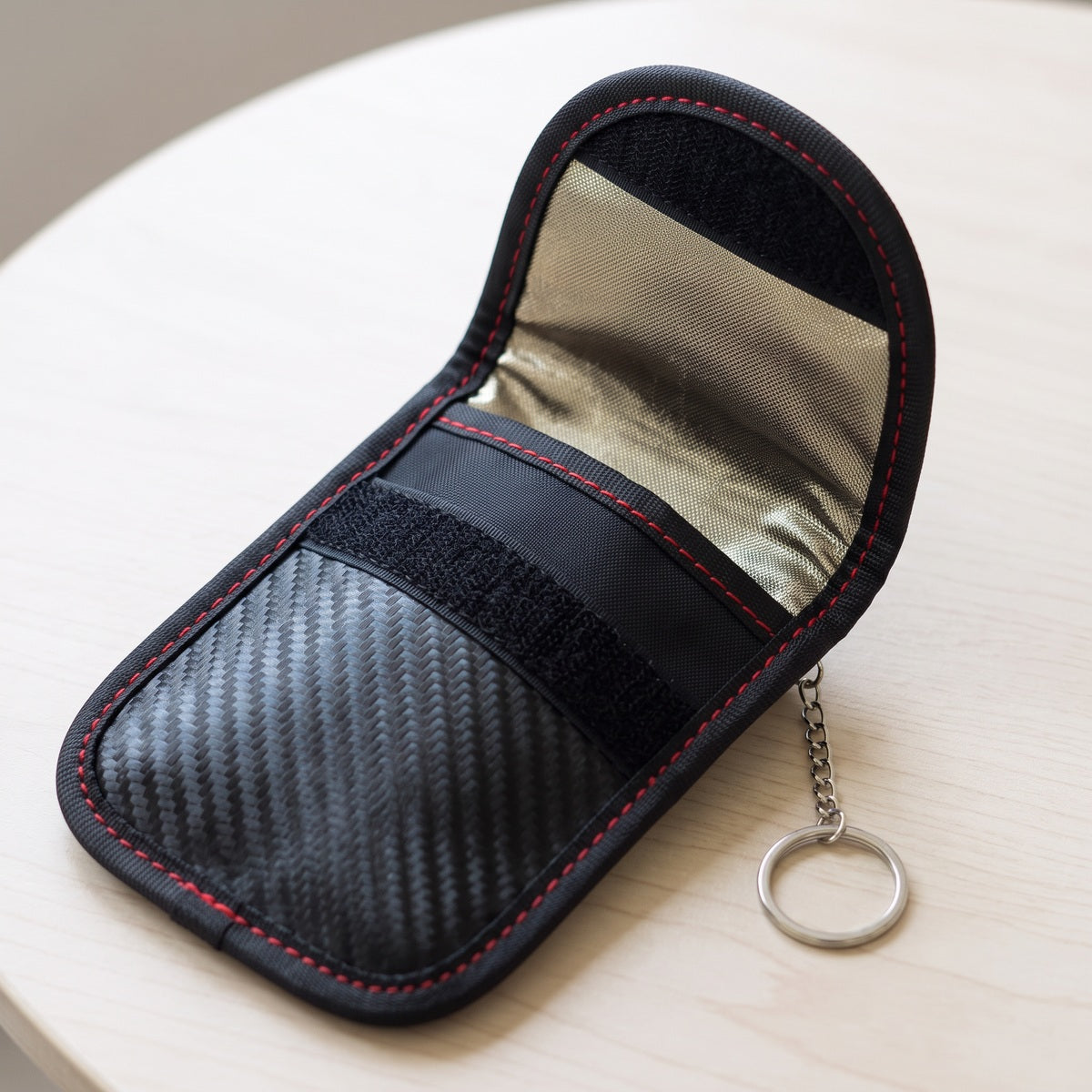 Open KeyQuiet pouch showing the shielded lining