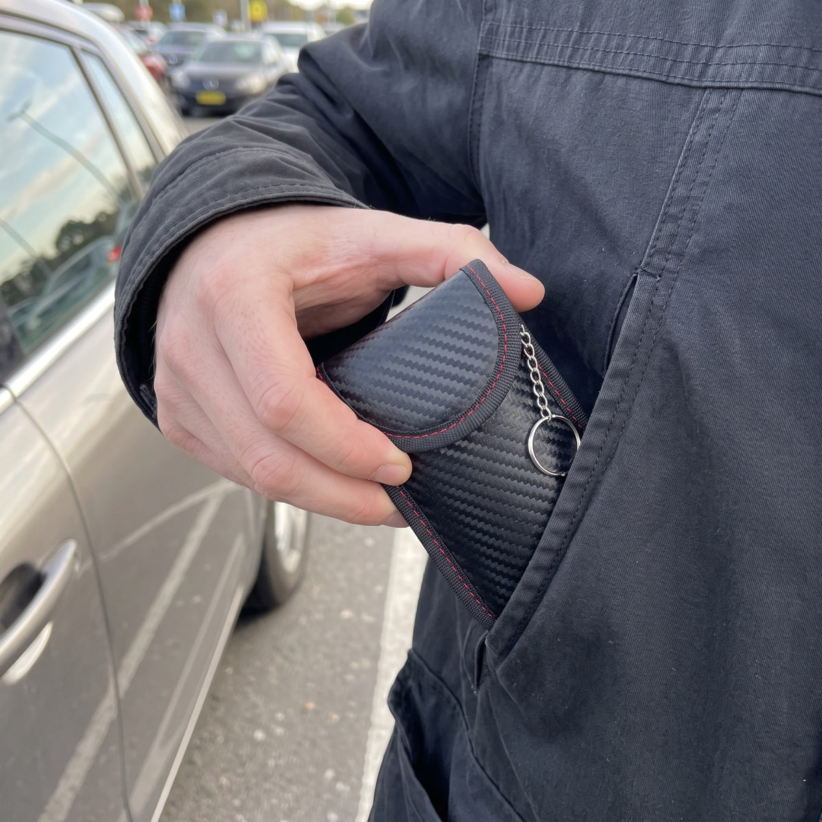 Closed pouch going into a jacket after shopping
